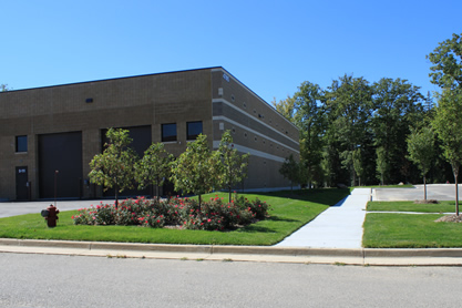 Lynn Corporate Park building exterior with landscaping and parking in Wixom MI